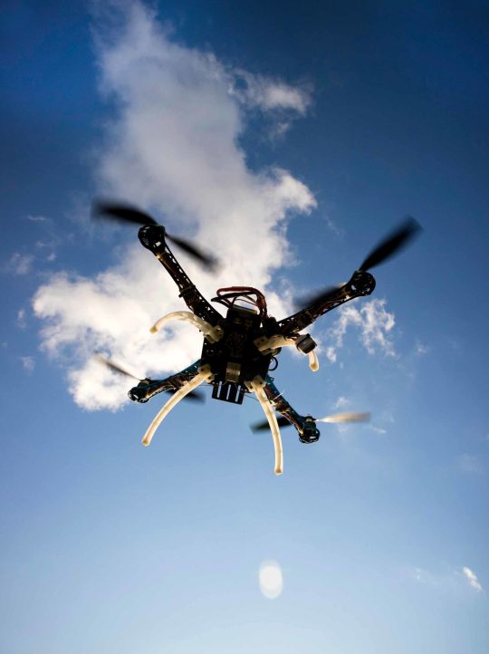 drone-in-flight-with-cloudy-sky-PTCUKNJ-scaled-1.jpg